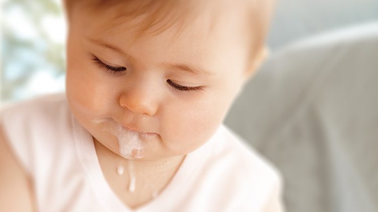 best method to help baby burp after feeding